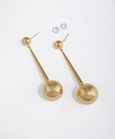 Gold-tone drop earrings with a small sphere stud and a long bar ending in a large polished sphere.