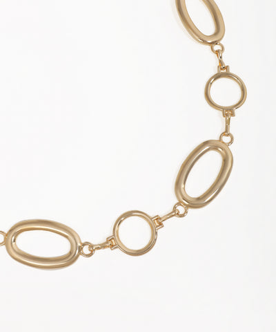 Gold chain necklace on a white background