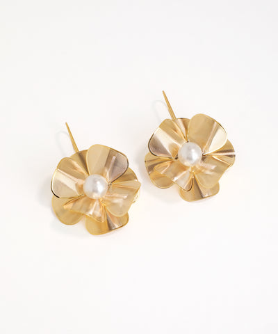 Gold flower-shaped earrings with pearl centers on a white background