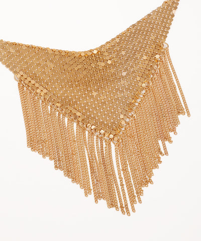 Gold beaded necklace with fringe on a white background