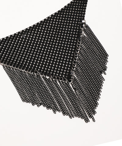 Black magnetic cube made of small balls on a white background