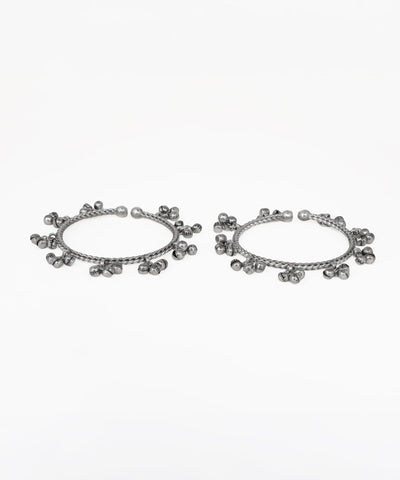 Oxidised silver-tone bangle bracelet pair with twisted band and small hanging ghungroo charms