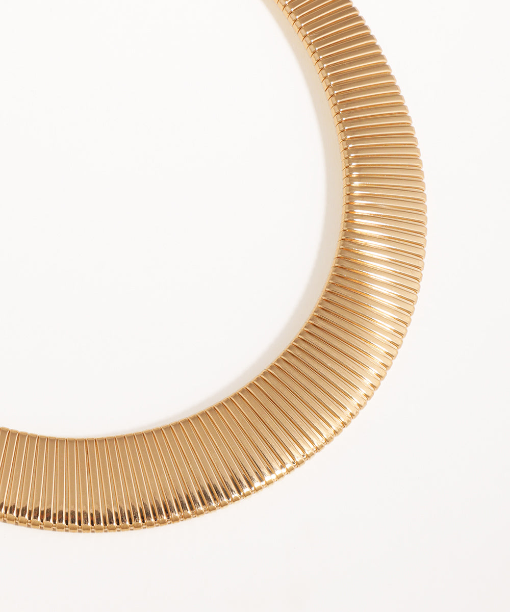 Gold necklace on a white background