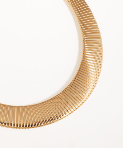 Gold necklace on a white background
