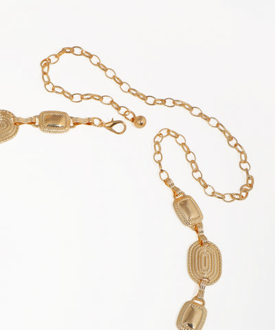 Gold chain necklace with decorative links on a white background