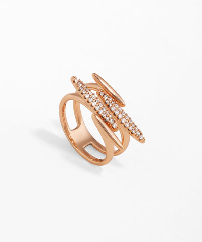 Rose-gold-tone ring with three intersecting bars, two set with sparkling clear stones.