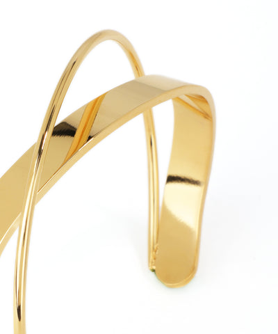 Gold bracelet on a white background