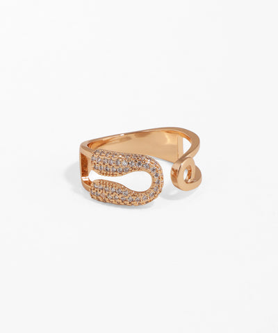 Rose gold ring with diamond accents on a white background