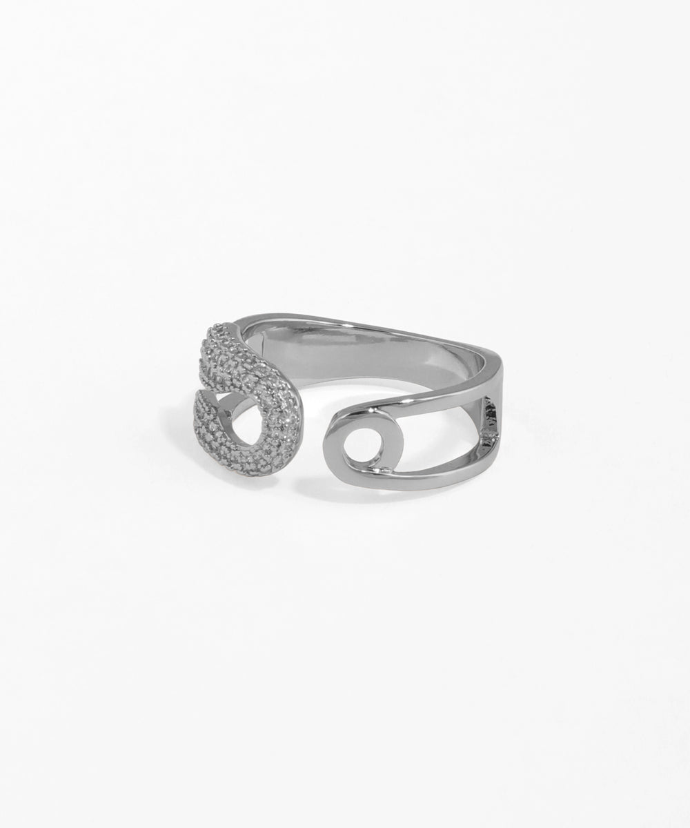Silver ring with a unique design on a white background