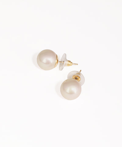 Pair of pearl earrings on a white background