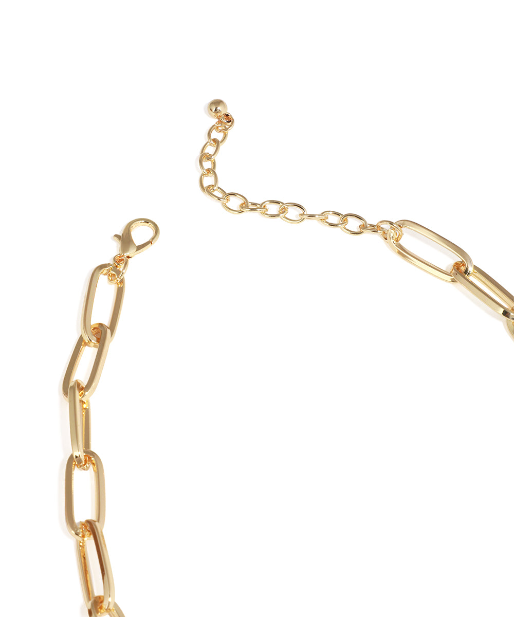 Gold chain bracelet on a white background