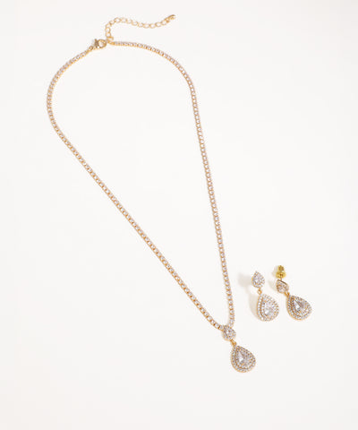 Gold-tone pendant set with tennis chain and sparkling teardrop Cubic Zirconia stones