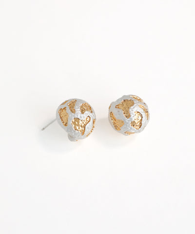 Pair of gold and silver stud earrings on a white background
