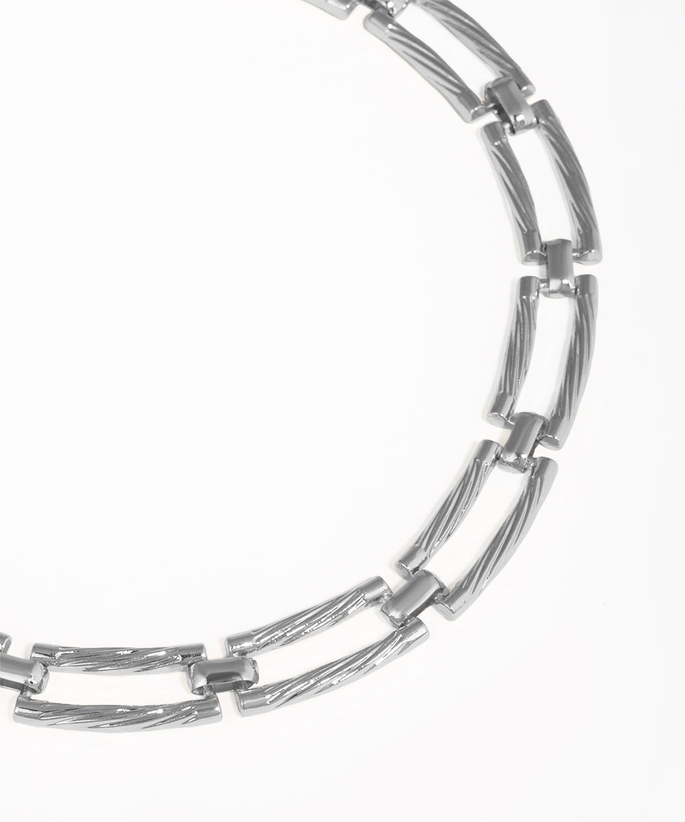 Silver chain necklace on a white background
