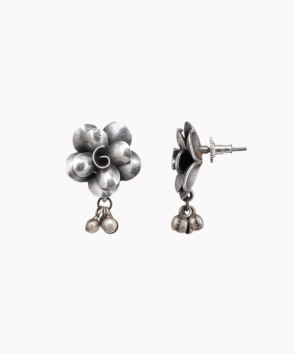 Oxidized silver-tone earrings with textured floral cluster and dangling bell charms