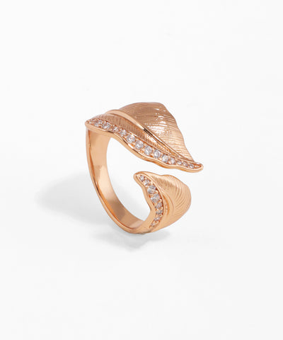 Rose-gold-tone ring with textured leaf design and clear cubic zirconia stones