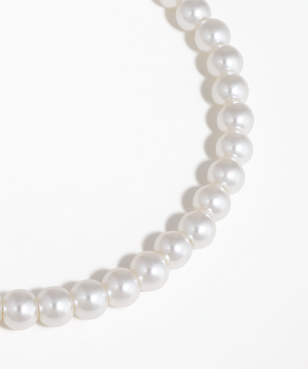 Pearl necklace on a white background