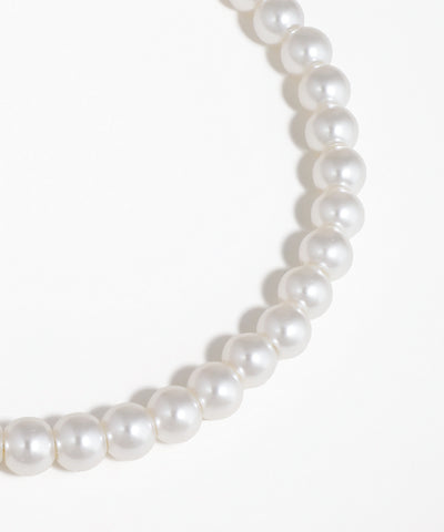 Pearl necklace on a white background