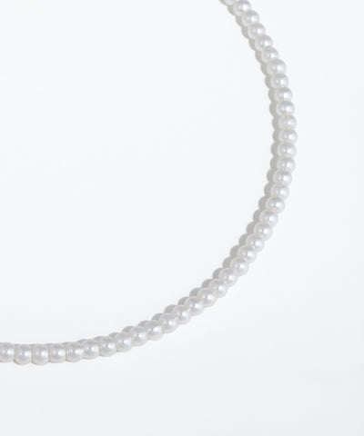 Pearl necklace on a white background