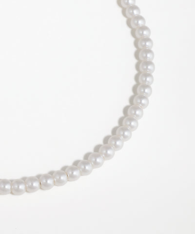 Pearl necklace on a white background
