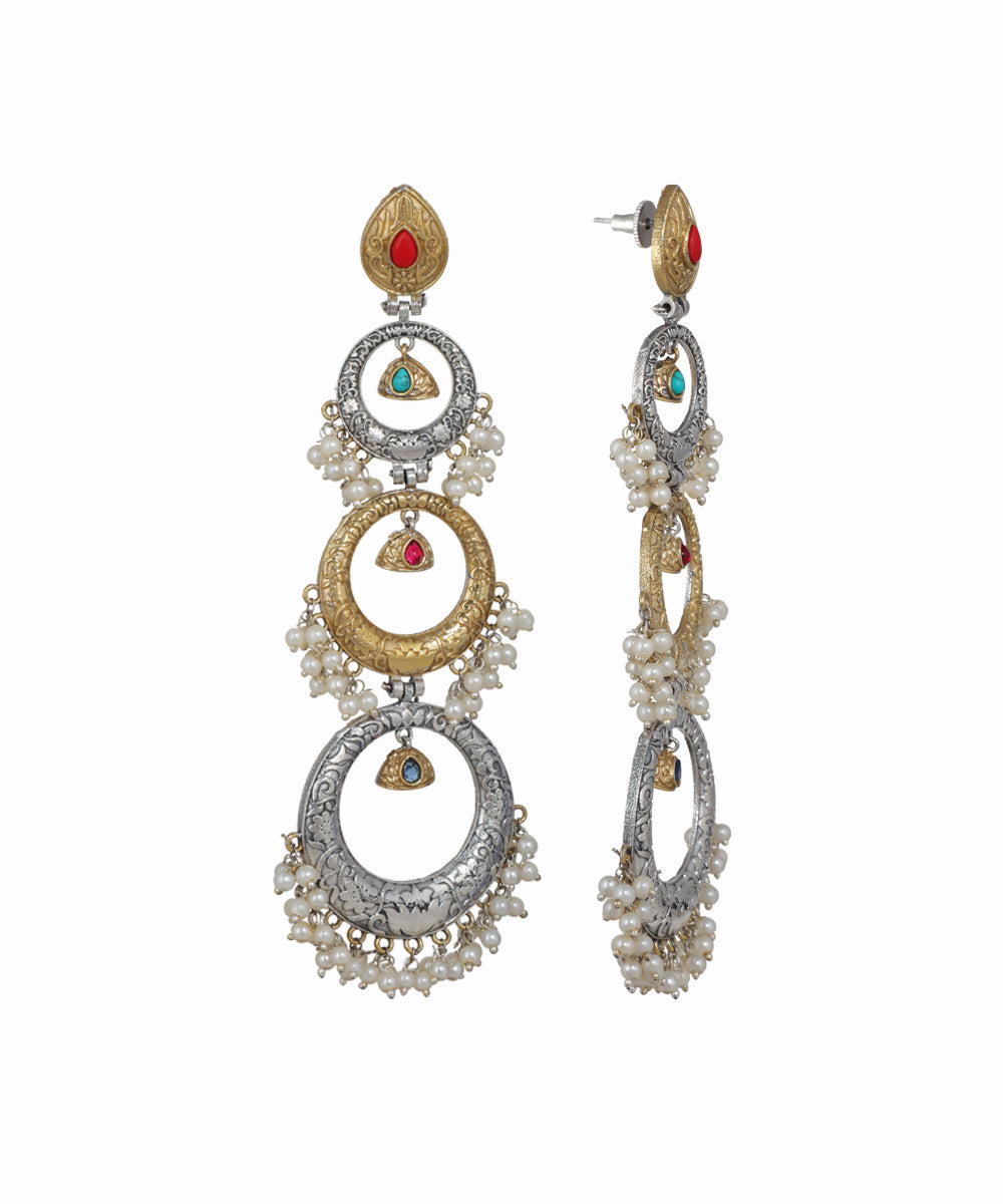 Mixed-tone oxidised earrings with ornate rings, colored stones, and small faux pearl drops