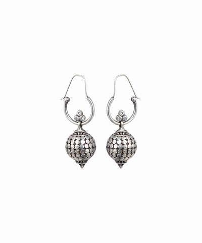 Pair of silver earrings on a white background