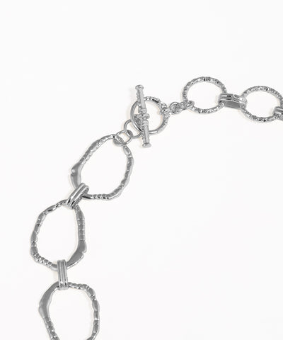 Silver chain bracelet on a white background