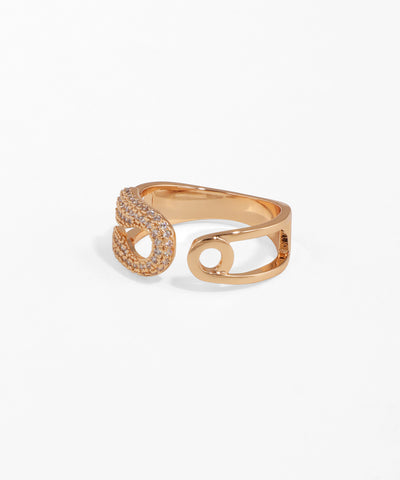 Rose gold ring with intricate design on a white background