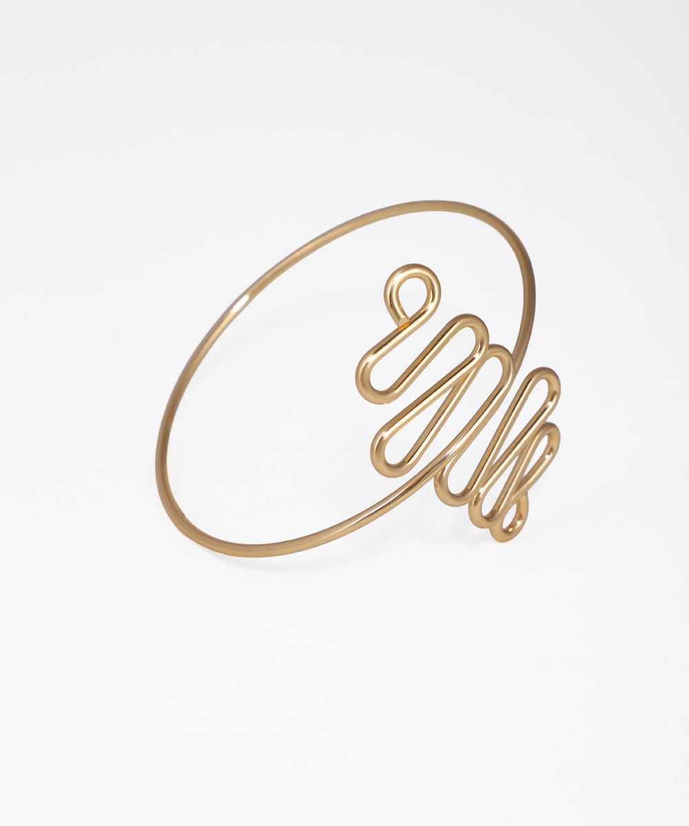 Gold bracelet on a white background