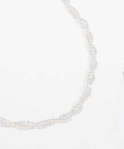 Pearl necklace on a white background