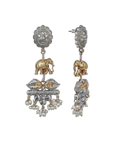 Ornate earrings with elephant design on a white background