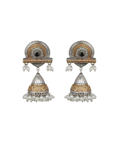 Pair of ornate earrings with intricate designs on a white background