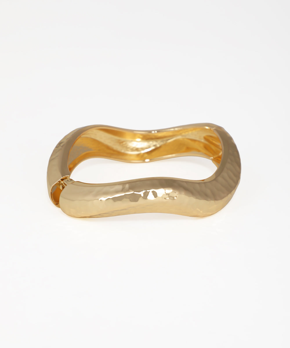 Gold-tone bangle kada with wavy, hammered texture and hinge closure