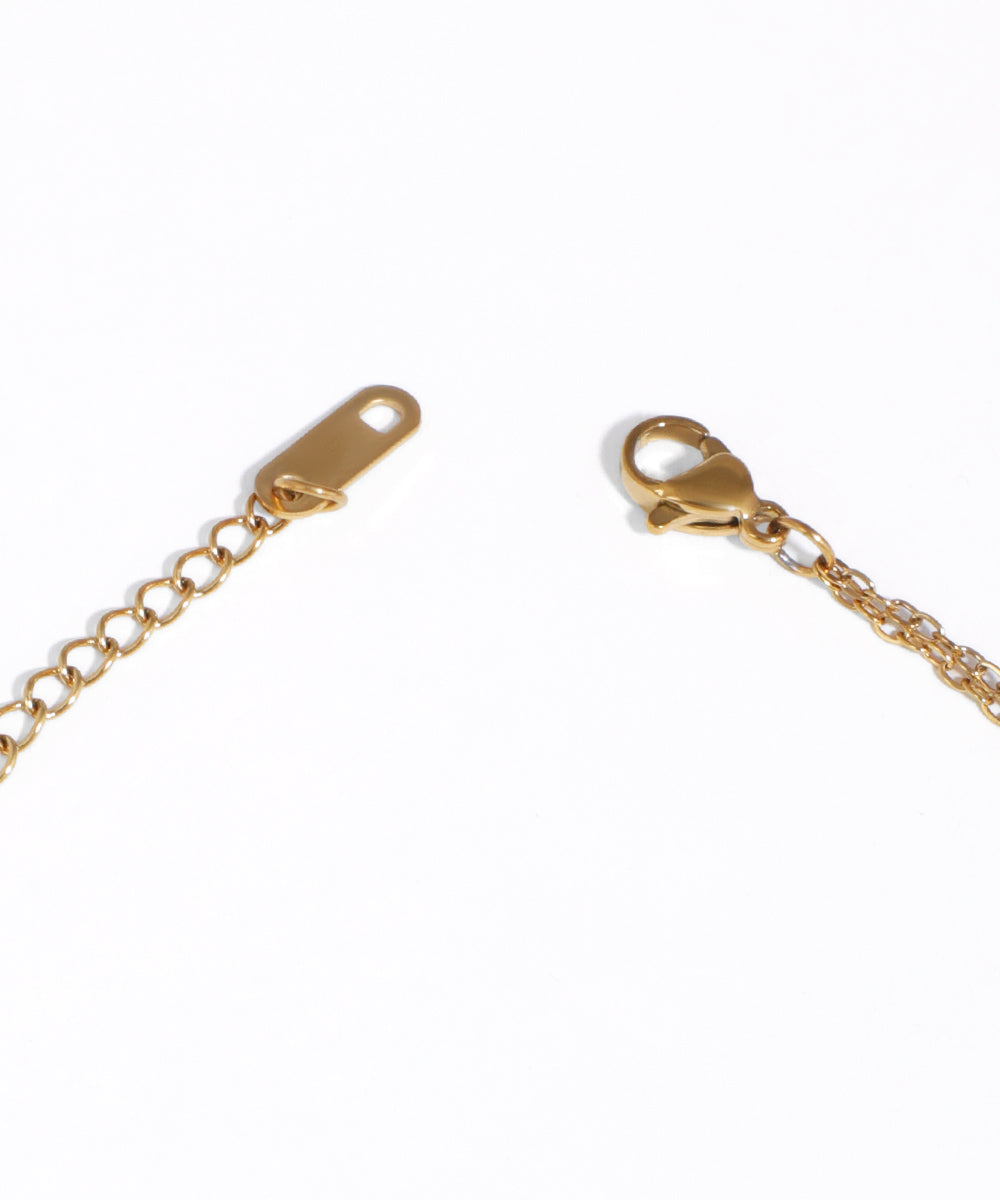 Gold chain with clasp on a white background