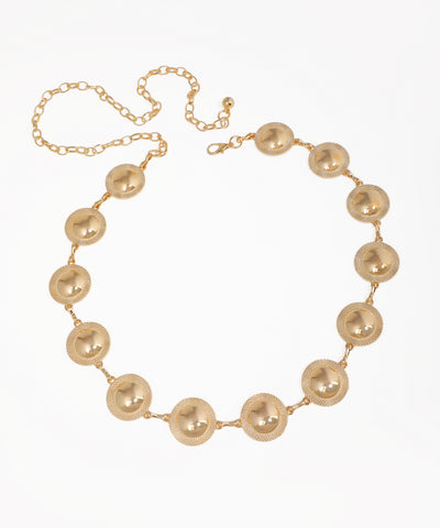 Gold necklace with round pendants on a white background