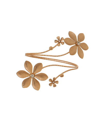 Gold-tone arm cuff with textured floral design and clear stones