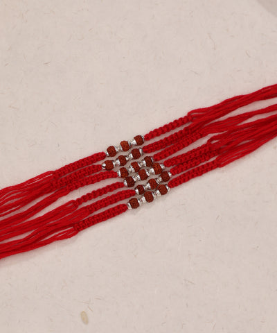 Red thread Rakhi set with brown Rudraksha and silver-tone beads
