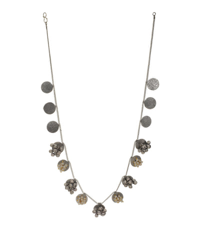 Silver-tone necklace with textured round discs and multi-bead clusters, some with faux pearls, on a delicate chain