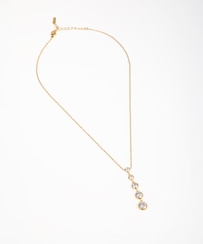 Gold-tone necklace with clear graduated round stones in a Y-drop design