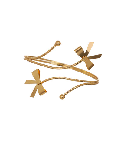 Gold-tone arm cuff with spiral wrap and sculpted bow details
