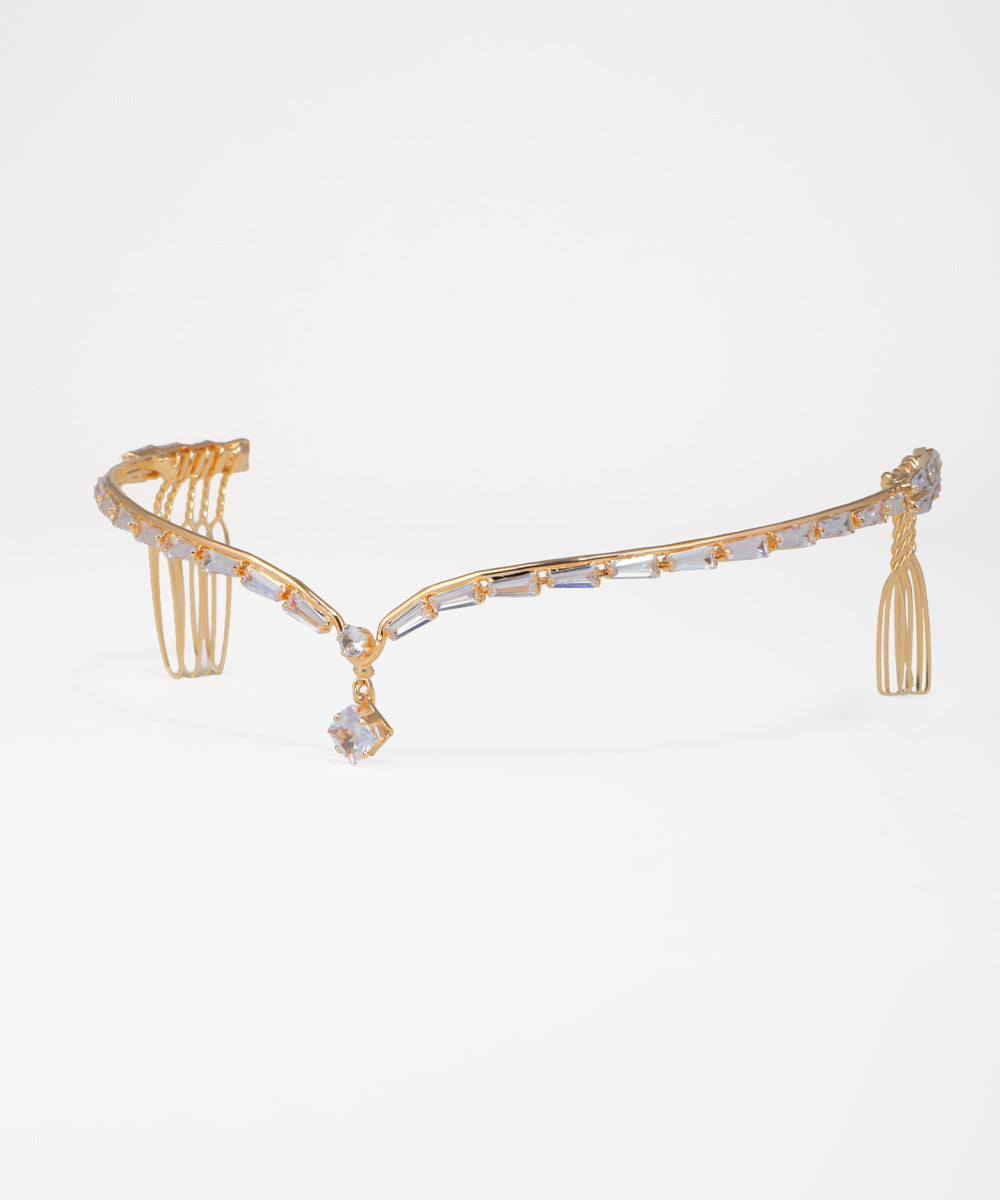 Gold-tone tiara with clear baguette stones and central drop design