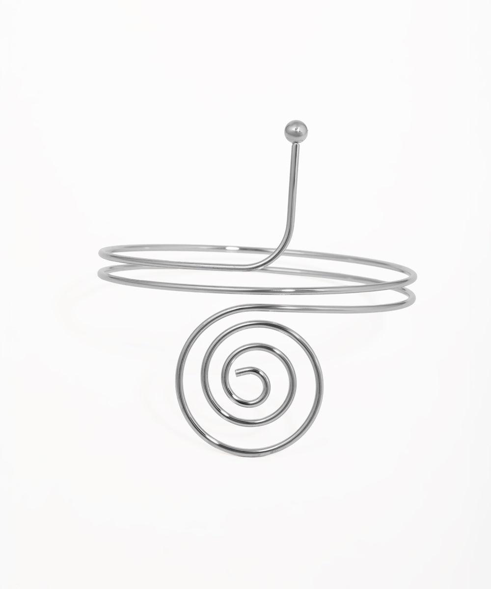 Silver-tone arm cuff with multi-coil wrap-around design and prominent front spiral
