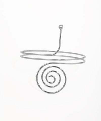 Silver-tone arm cuff with multi-coil wrap-around design and prominent front spiral