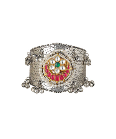 Oxidise silver-tone cuff bracelet with central kundan-style floral motif, red and green stones, and faux pearls