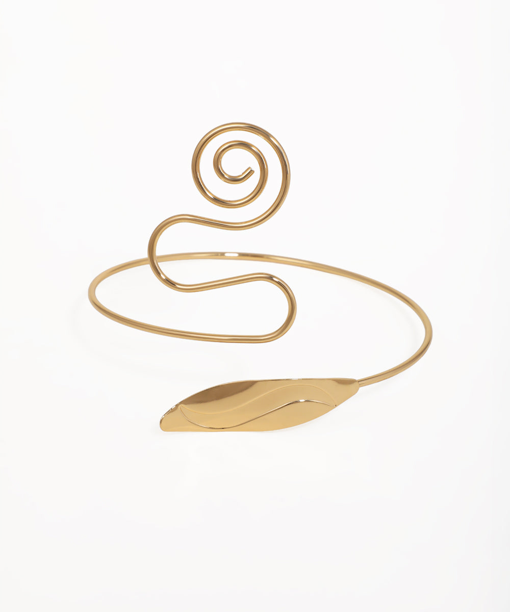 Gold-tone arm cuff with spiral and leaf design