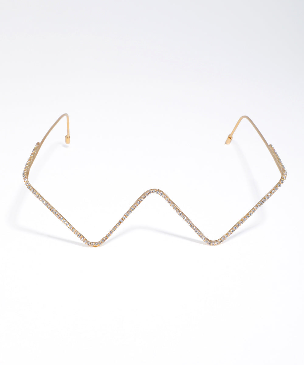 Gold-tone facelet with a zigzag shape, covered in clear sparkling stones, designed with ear hooks.
