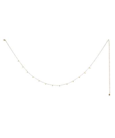 Gold-tone waist chain with small cylindrical bead dangles and adjustable extender.