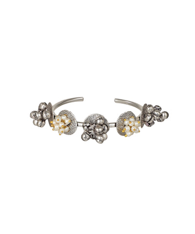 Oxidised hand cuff with textured metallic clusters and faux pearls