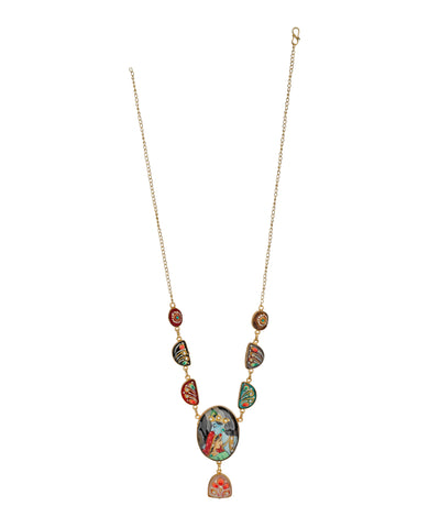 A gold-tone chain necklace featuring a series of colorful, patterned oval and teardrop charms, culminating in a larger central pendant with a floral design and a small teardrop charm below, shown against a plain white background.