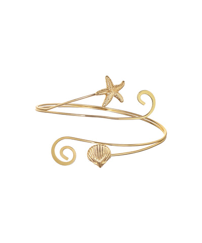 Gold-tone arm cuff with starfish and seashell motifs and spiraling bands